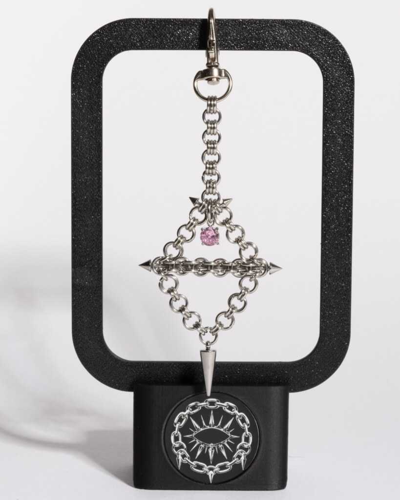 Axis Charm industrial piercing charm pink variant detail view by silentchxos