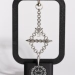 Axis Charm industrial piercing charm white variant detail view by silentchxos