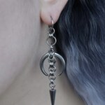 Midnight Spike, crescent moon chainmail earrings worn on an ear -close-up by silentchxos