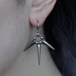 Triple Eclipse, three spiked chainmail earrings worn on an ear -close-up by silentchxos